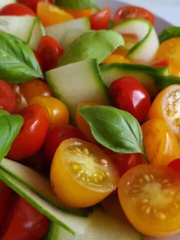 Close up of tomato and cucumber salad.