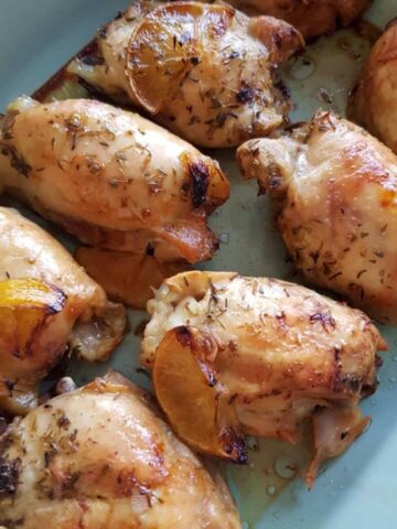 a tray with lemon chicken thighs.