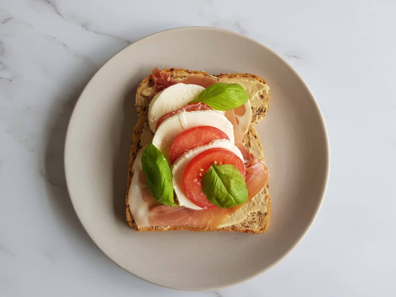 Tomato and mozzarella salad sandwich