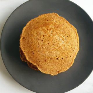 Gingerbread flavored pancake on a plate.