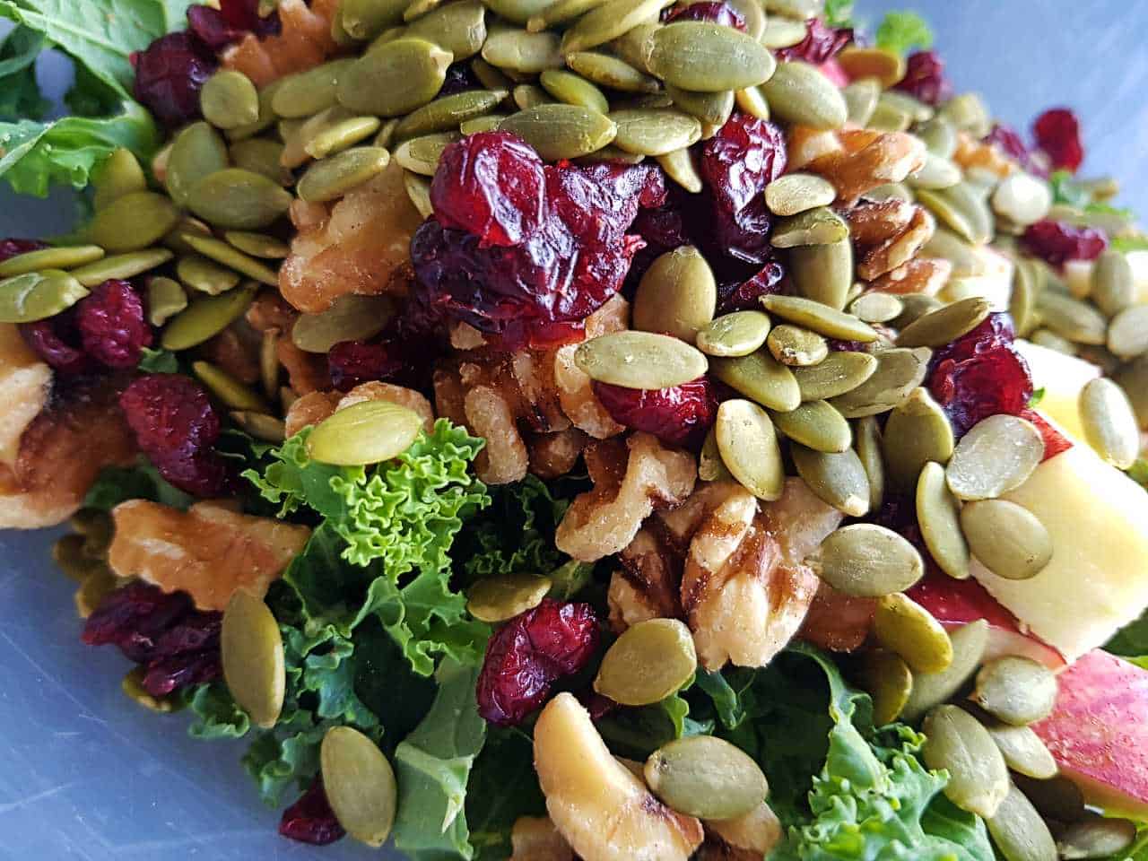 All the ingredients for the salad recipe in a bowl, unmixed.