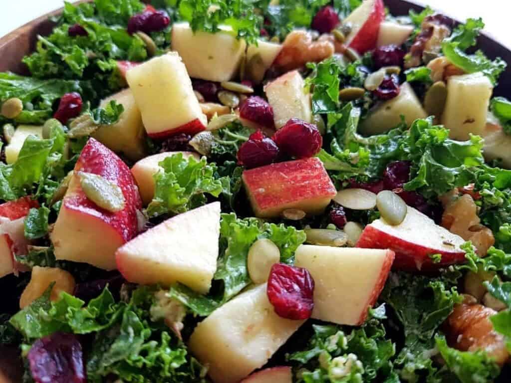 Kale salad with apples and cranberries + tahini dressing Hint of Healthy