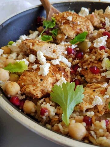 skillet with chicken,feta and couscous.