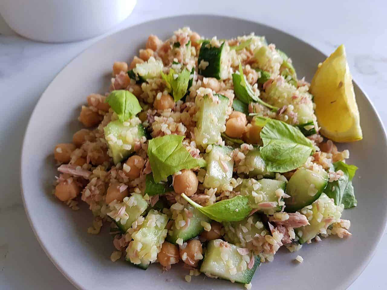 Tuna bulgur salad with chickpeas on a plate.