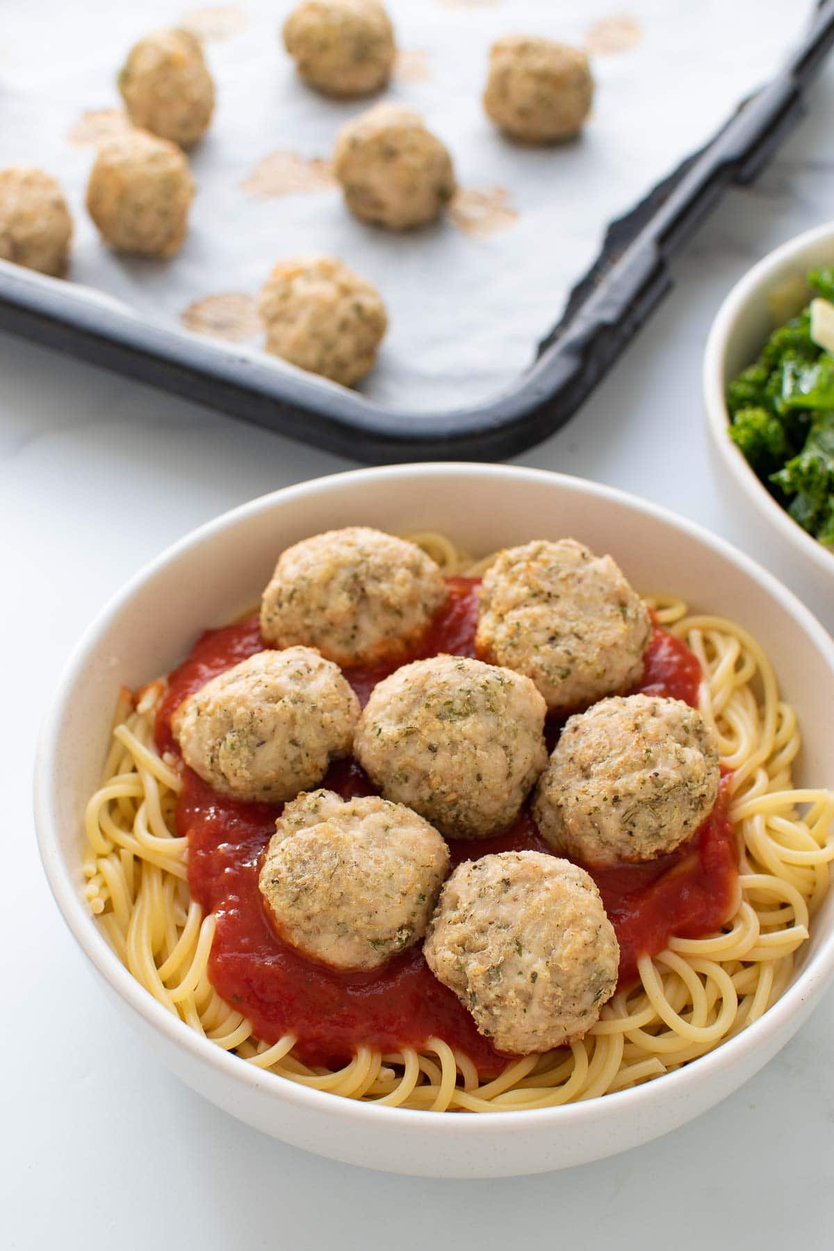 Baked meatballs with pasta.