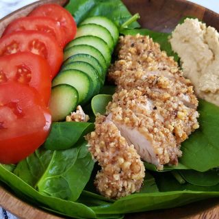 walnut coated chicken with salad.