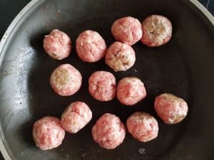 pan frying meatballs.