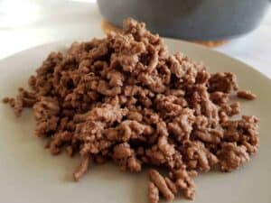 Browned mince on a gray plate.