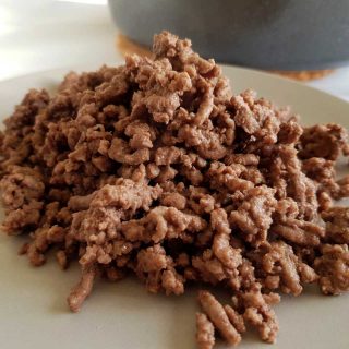 Browned mince on a gray plate.