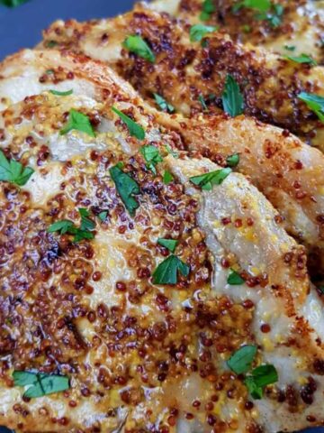 close up of honey mustard glazed pork chops.