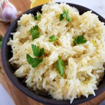 a bowl of basmati rice with lemon and garlic.