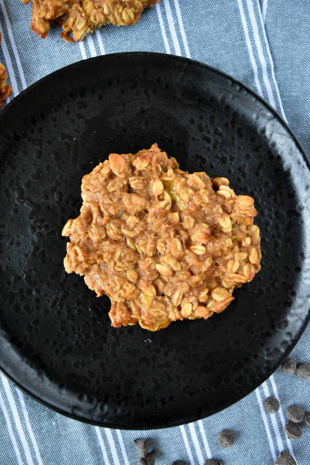 Peanut butter oatmeal cookie on a plate.