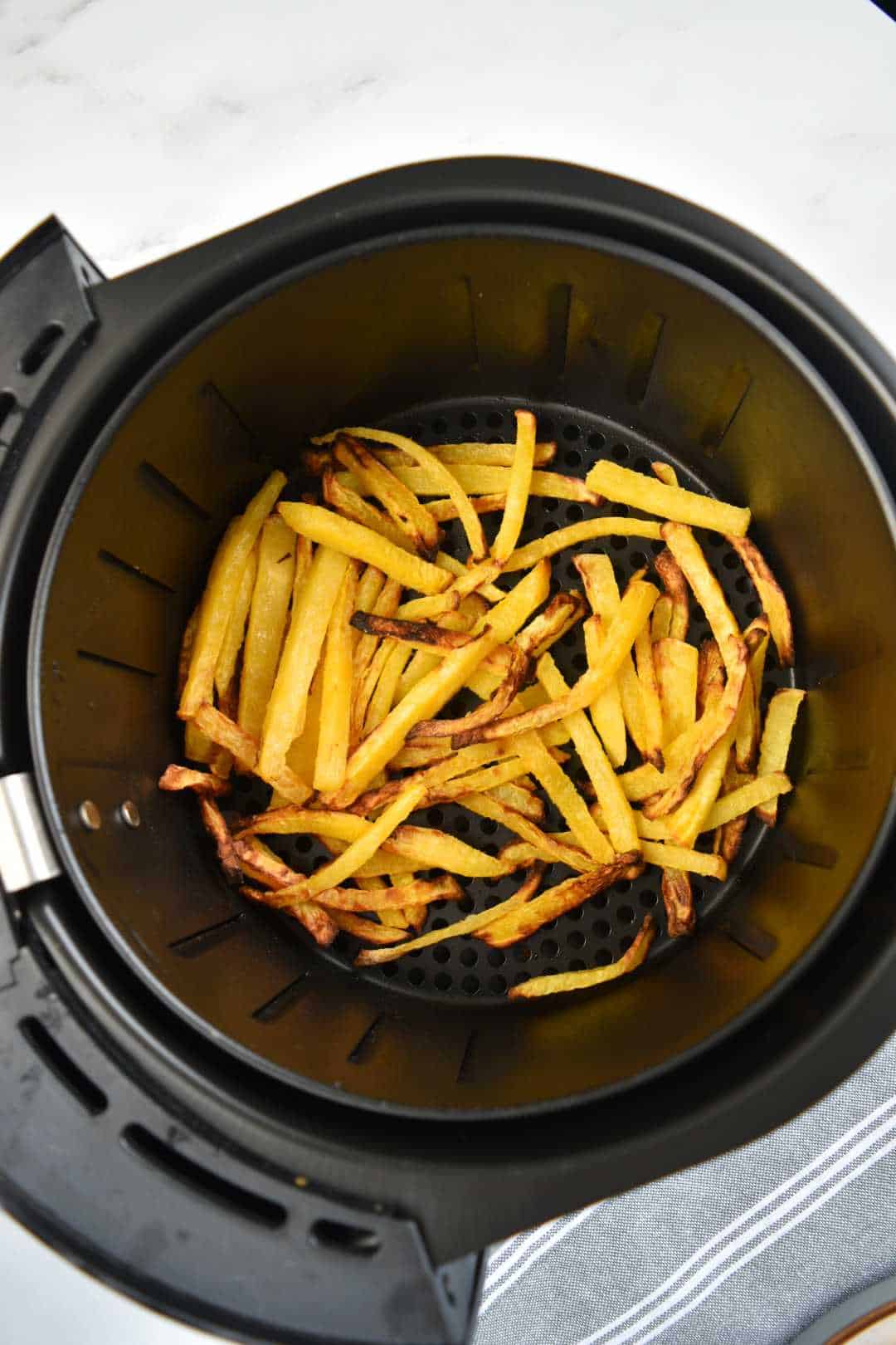 Rutabaga fries in an air fryer.