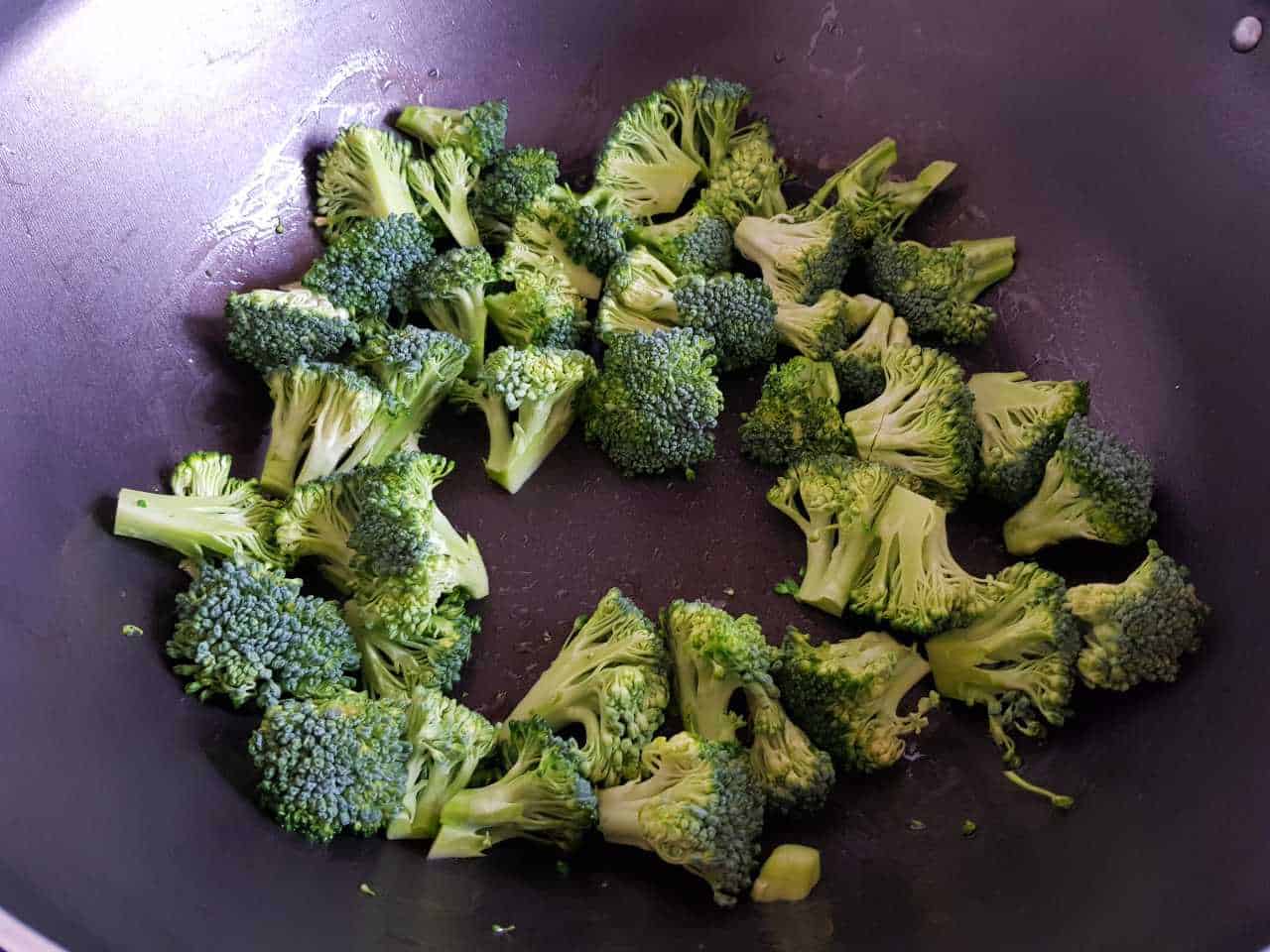 Broccoli in a wok.