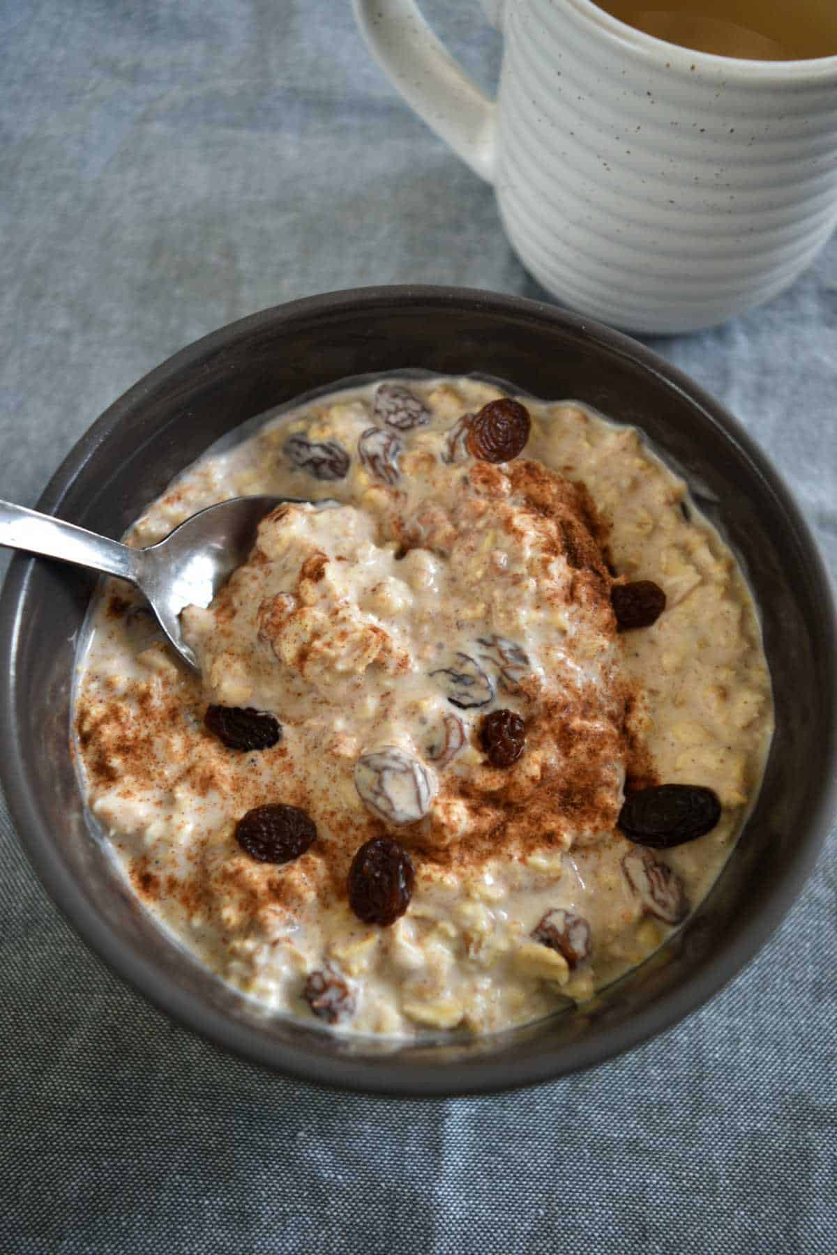 Cinnamon raisin overnight oats in a bowl.