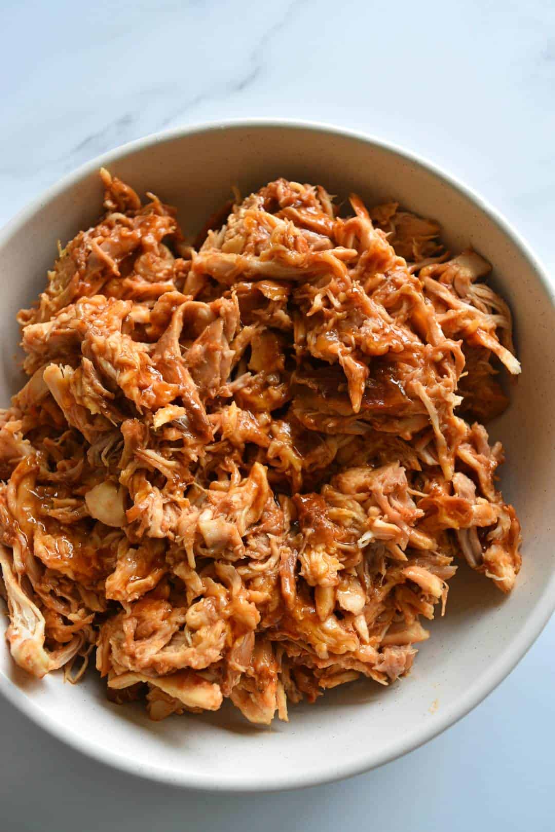 Pulled BBQ chicken in a bowl.