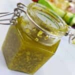 Pesto vinaigrette in a jar.