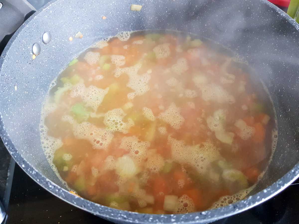 Soup boiling in a pot.