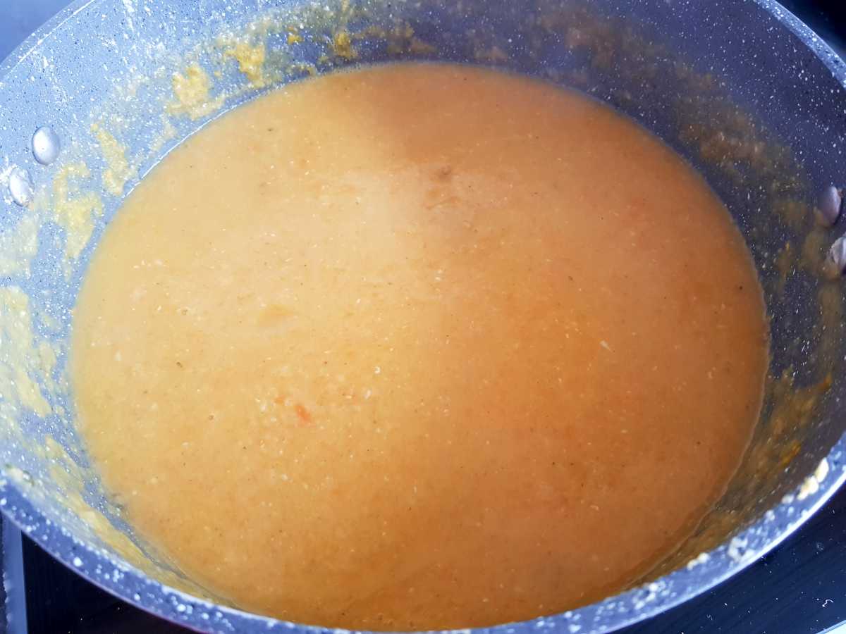 Smooth lentil soup in a pot.