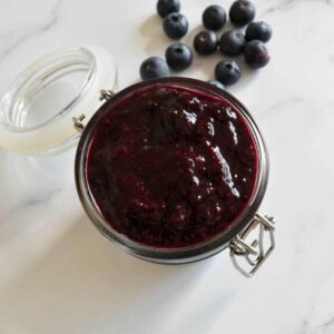 Blueberry chia jam in a jar.
