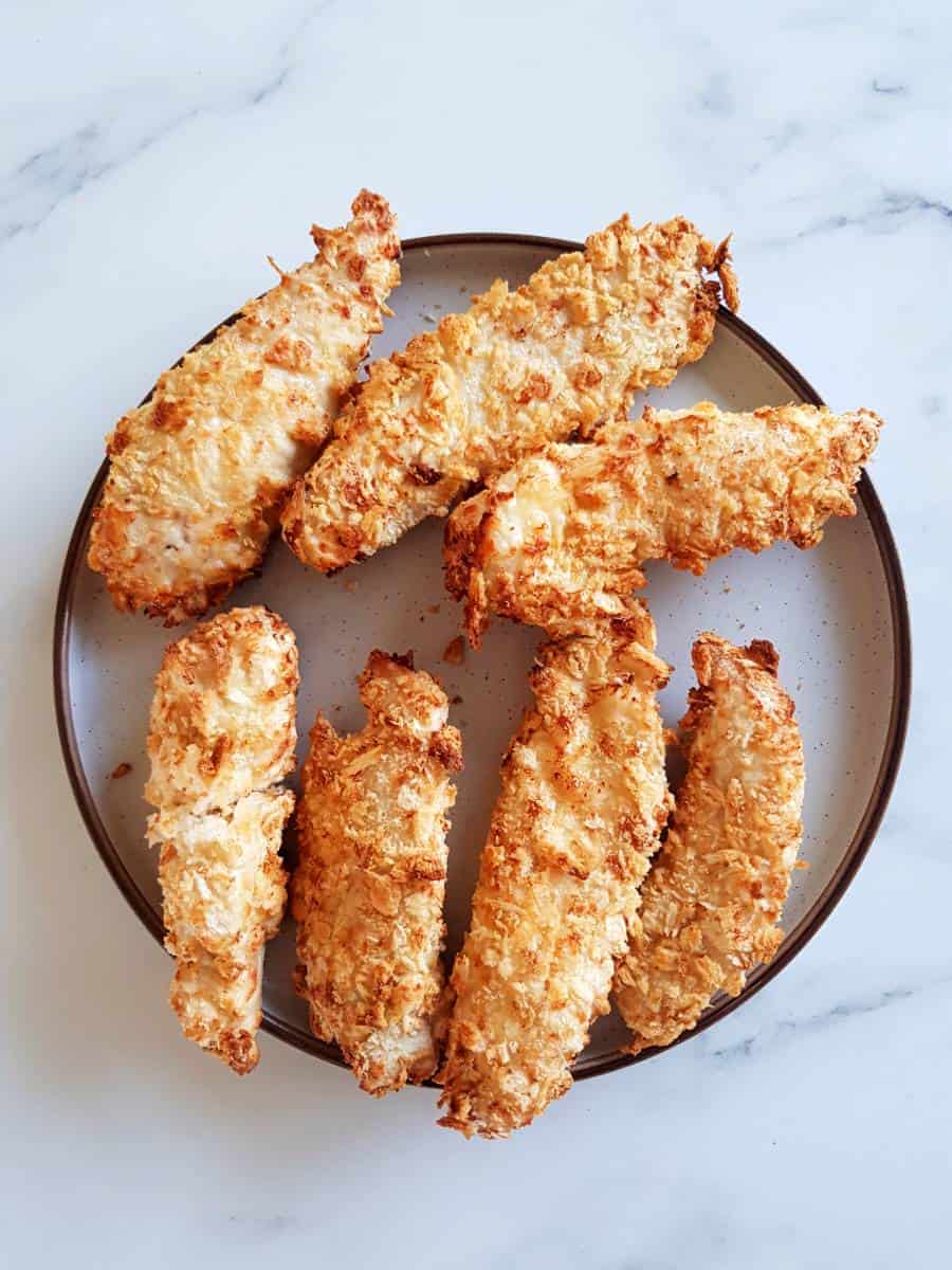 Air fryer breaded chicken on a plate.