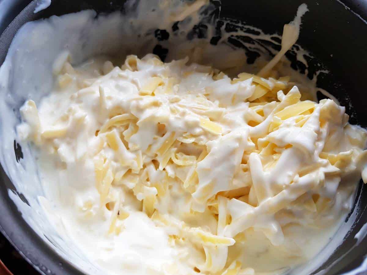 Cheese melting in a pot.