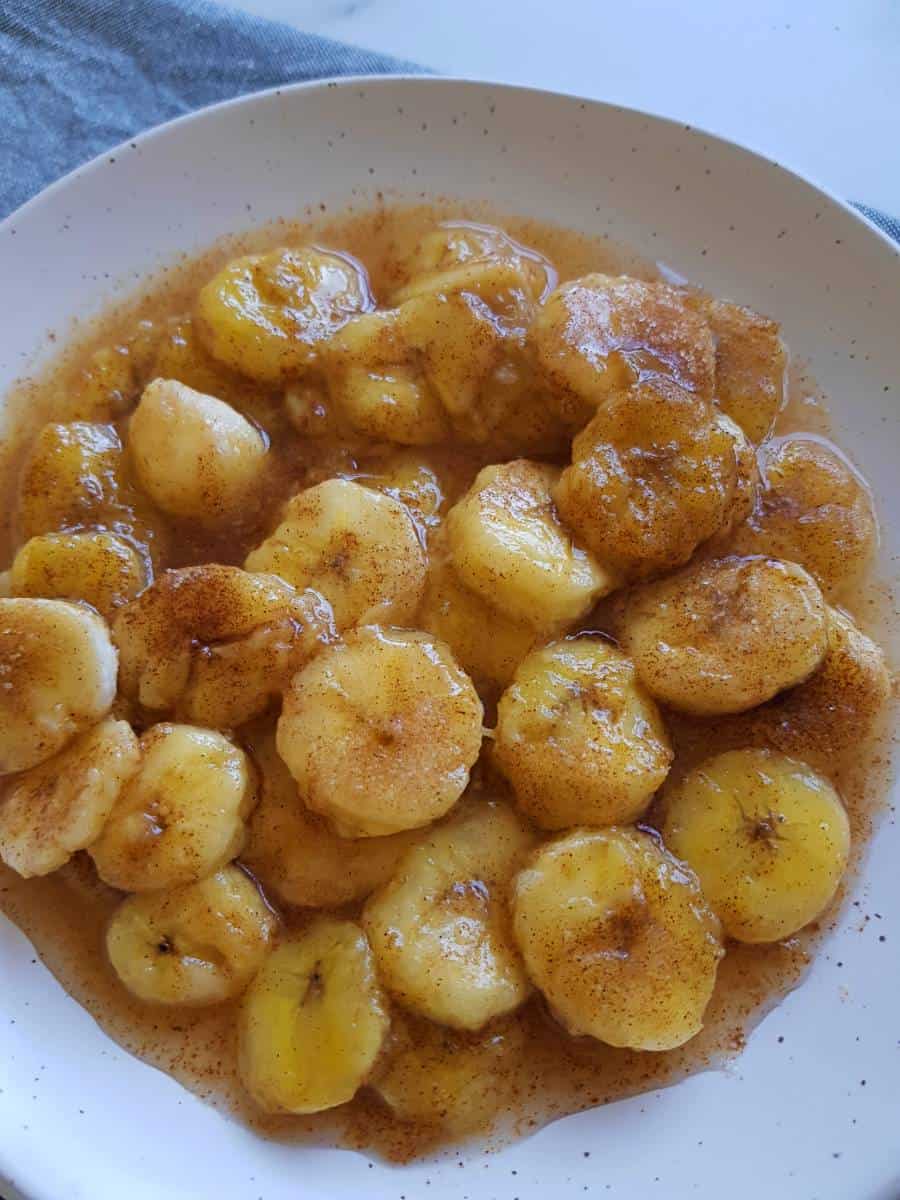 Churro banana bites on a plate.