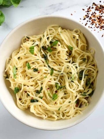 Garlic basil pasta in bowl.