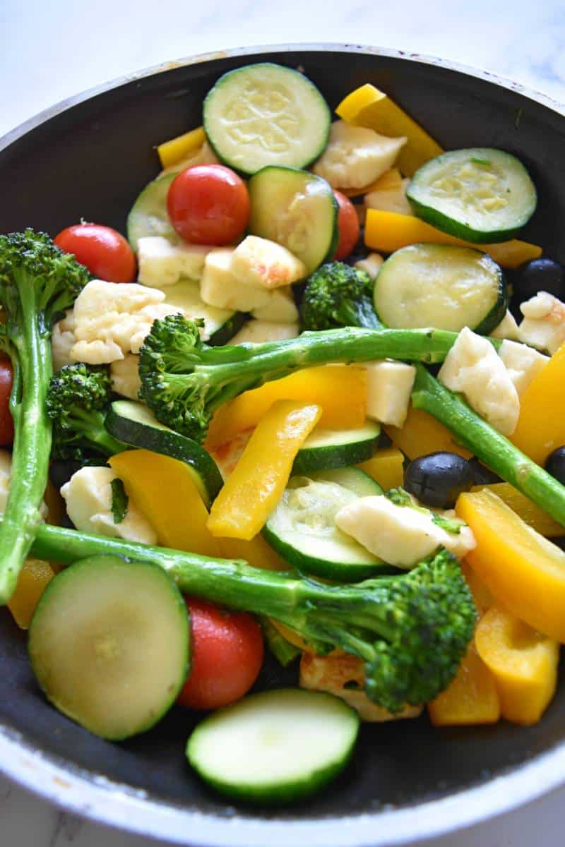 Halloumi stir fry in a frying pan.