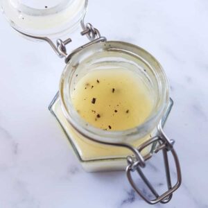 Lemon pepper salad dressing in a jar.