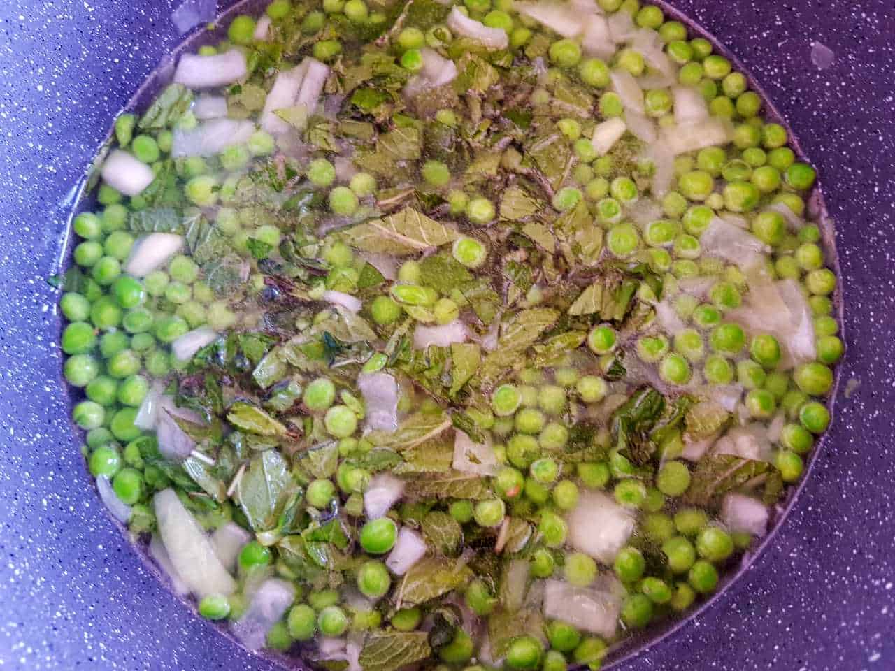 Peas and mint in a pot.