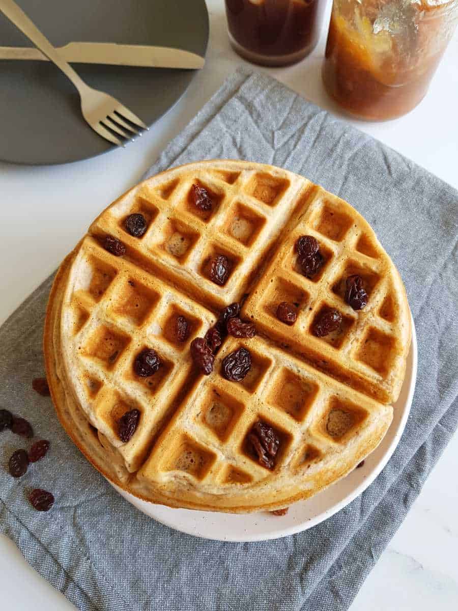 Cinnamon raisin waffles on a plate.