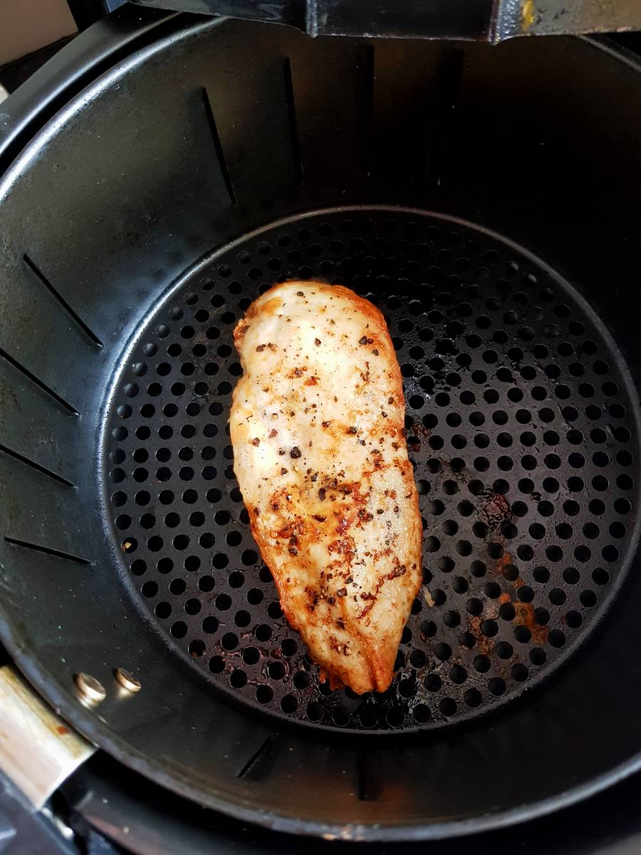 Salt and pepper chicken breast in air fryer.