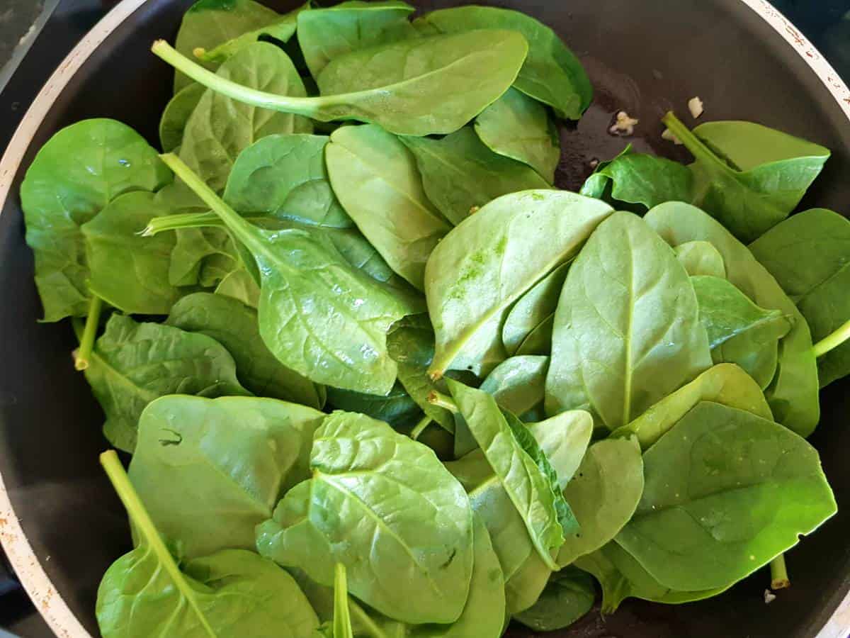 Spinach in a frying pan.