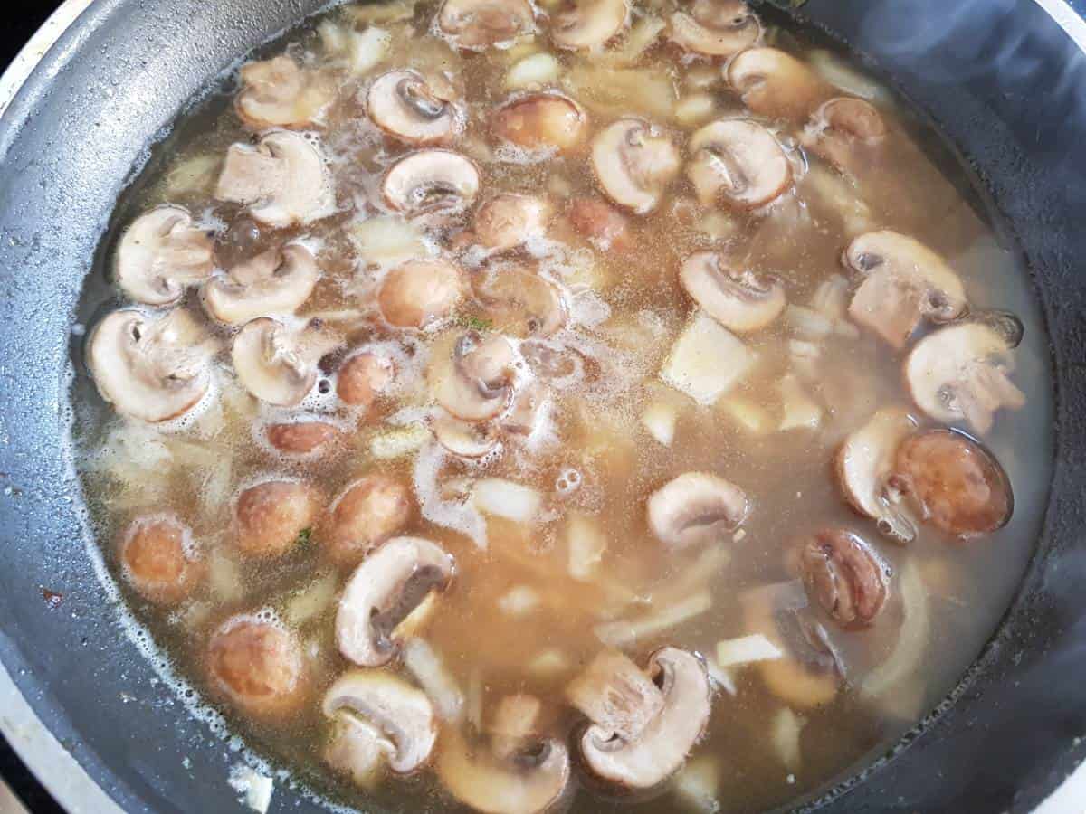 Marsala sauce in a frying pan.