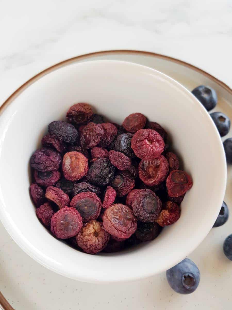 Dried blueberries in a bowl.