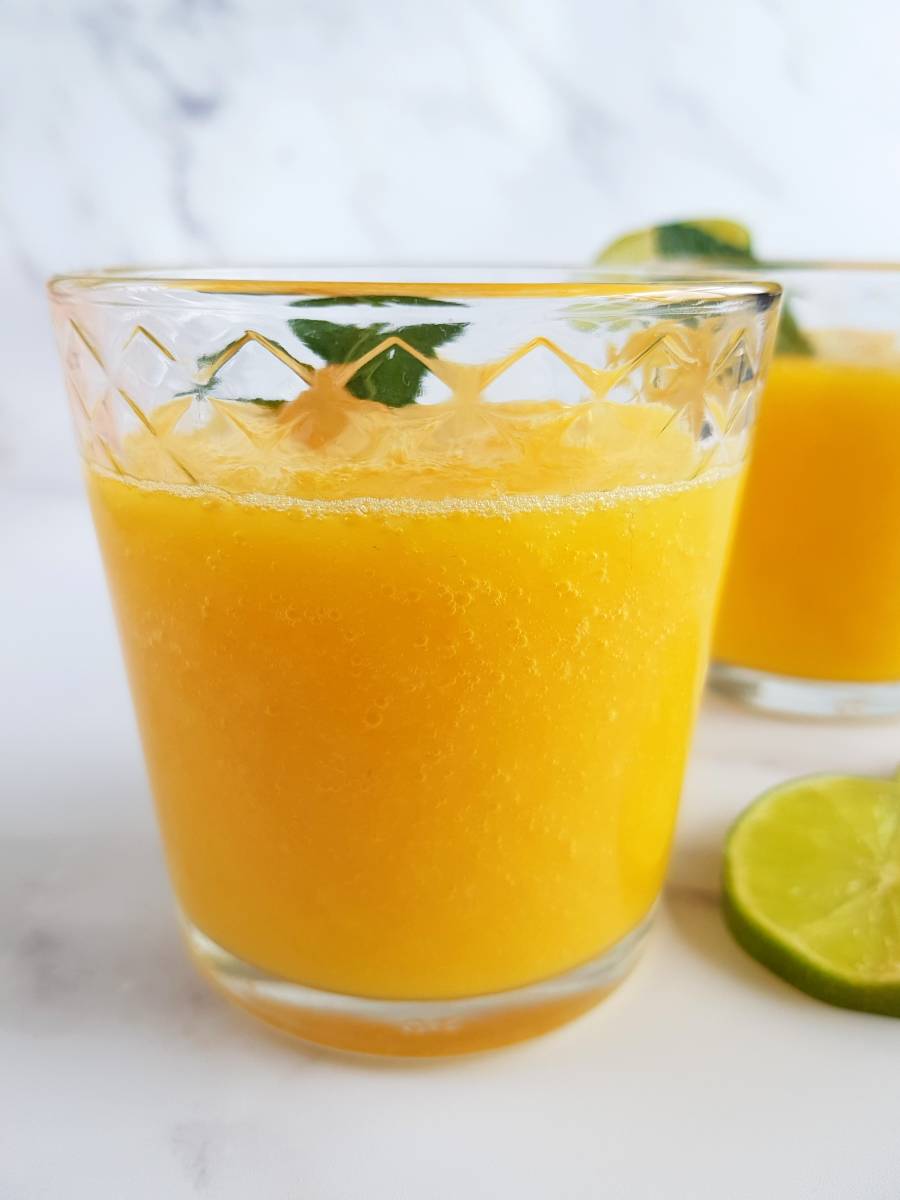 Mexican mango drink on a marble table.