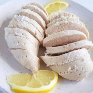 Poached chicken breast fillets.