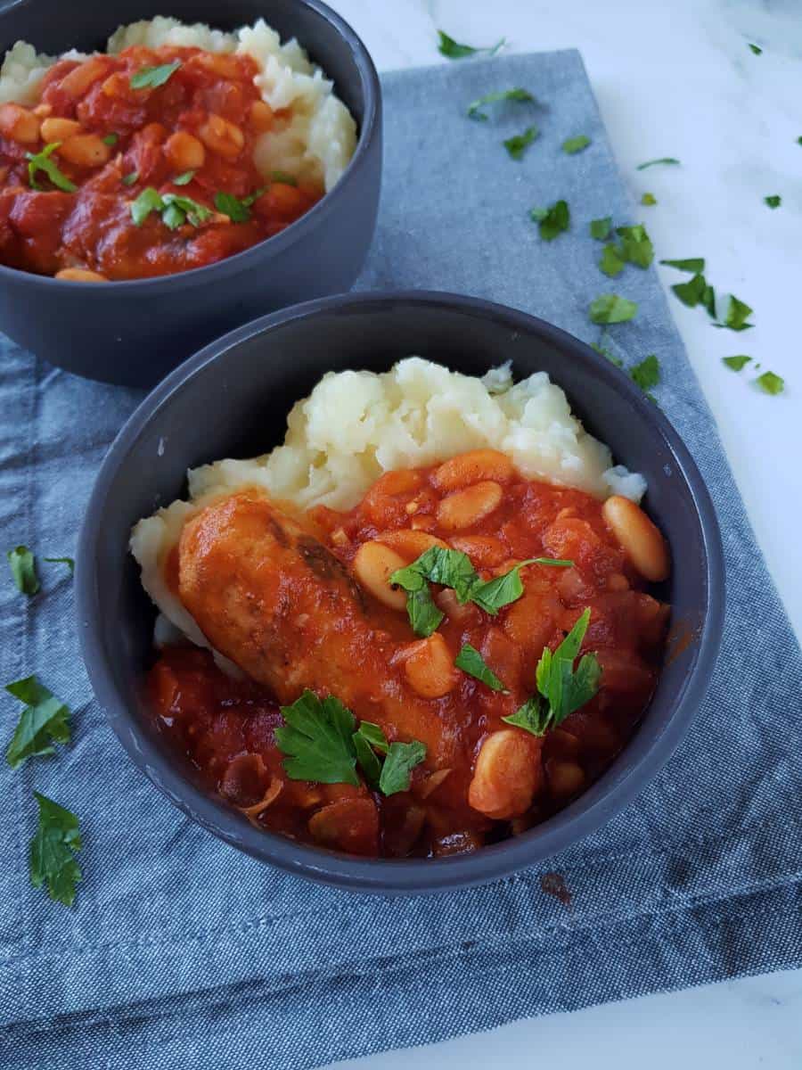 Sausage and bean stew in bowls.