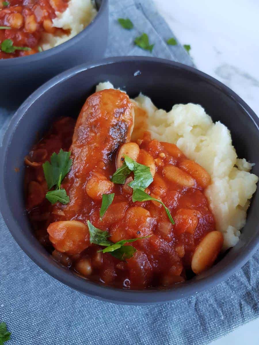 Sausage stew with cannellini beans with mashed potatoes.