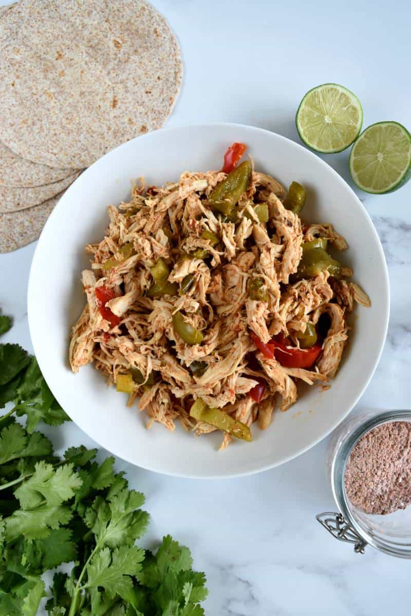 Slow cooker chicken fajitas in a bowl.