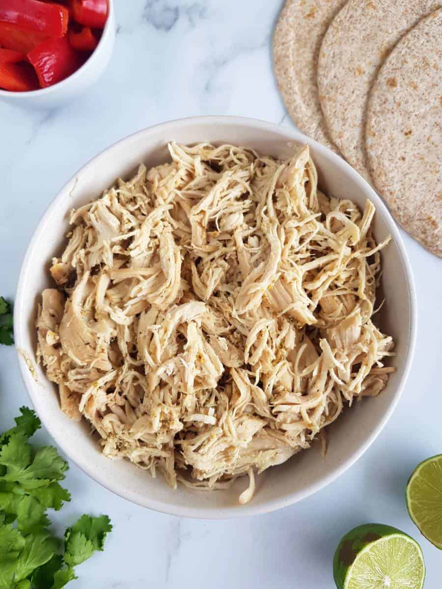 Slow cooker mojo chicken in a bowl.