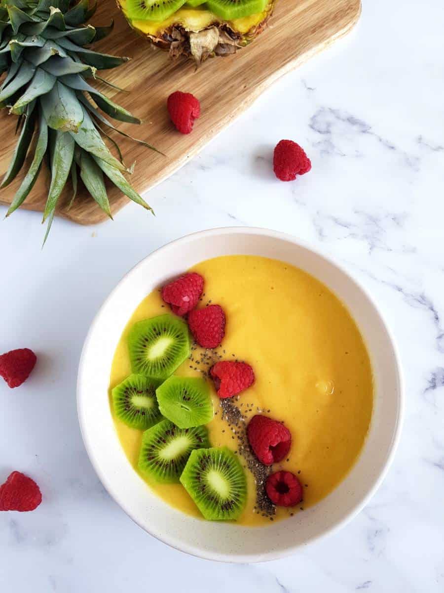 Smoothie bowl with mango and pineapple.