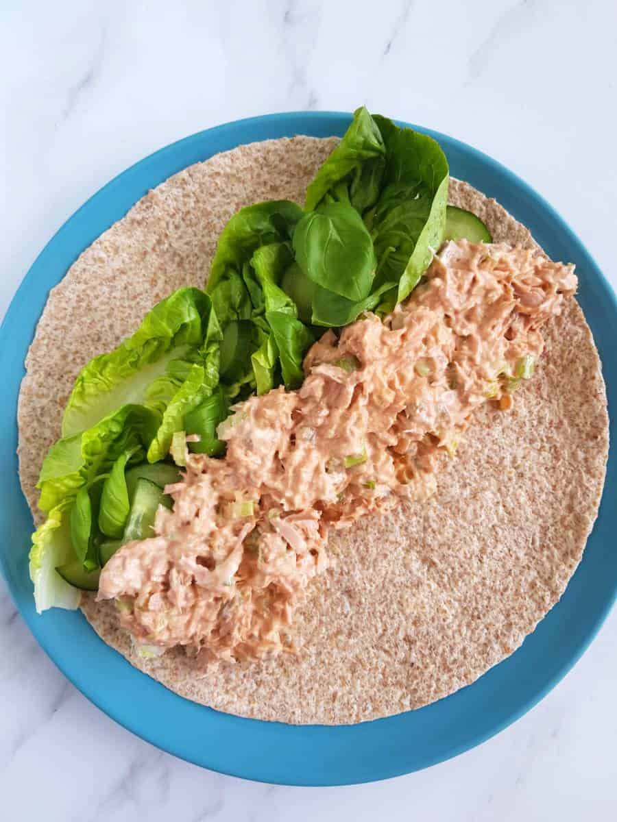 Spicy tuna salad on tortilla.