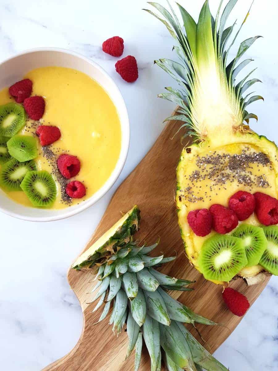 Tropical mango and pineapple smoothie bowl.