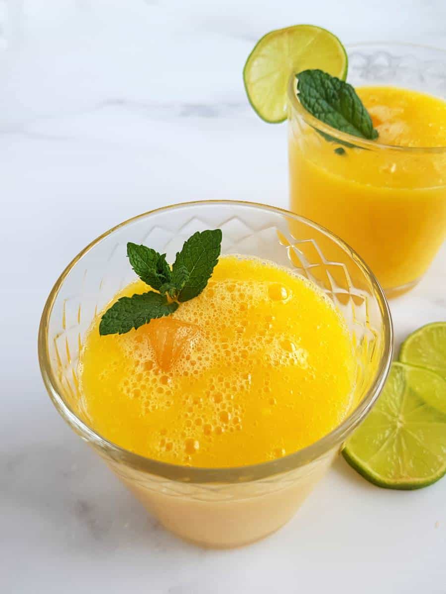 mango agua fresca with ice cubes.