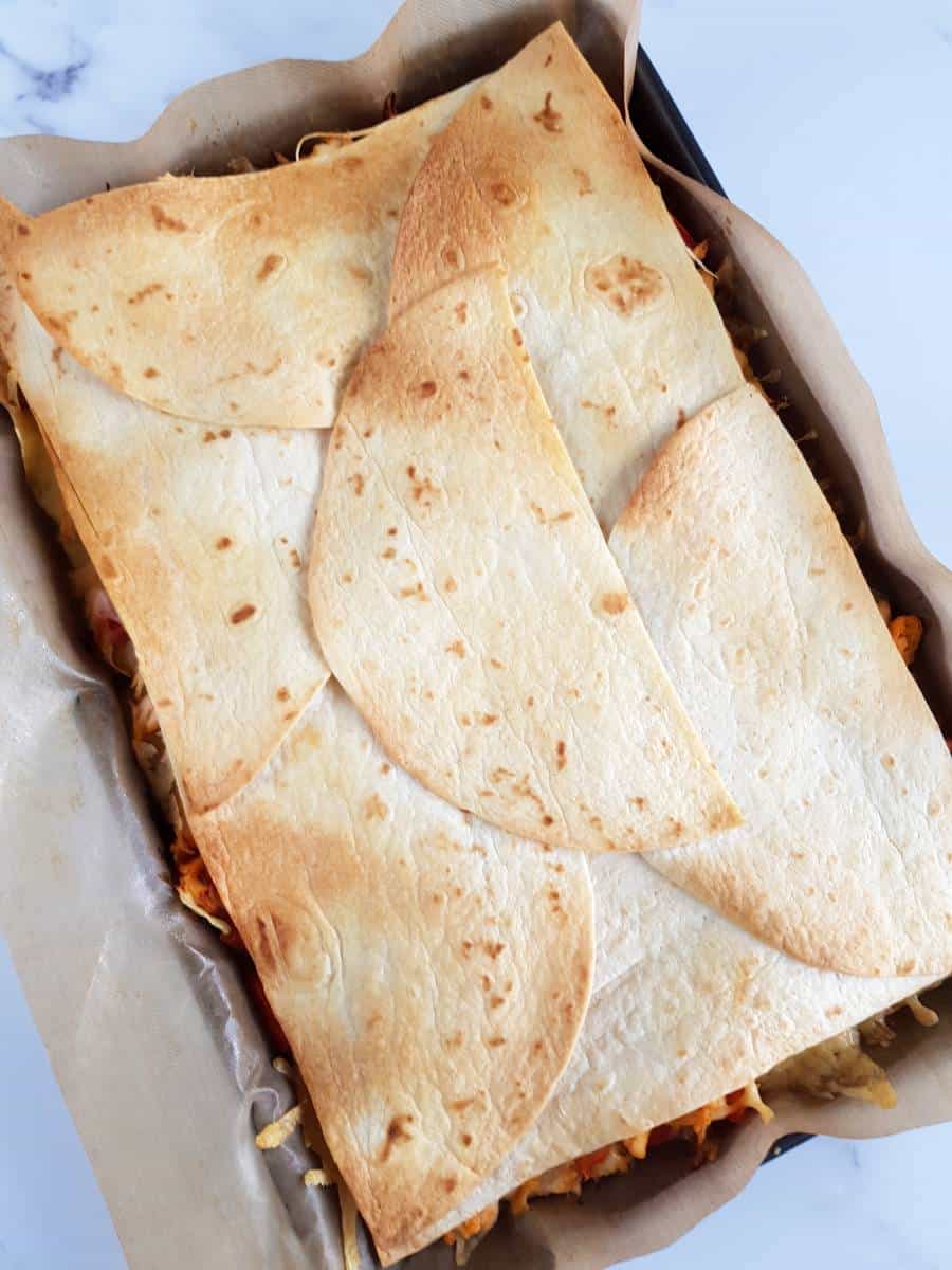 sheet pan buffalo chicken quesadillas.