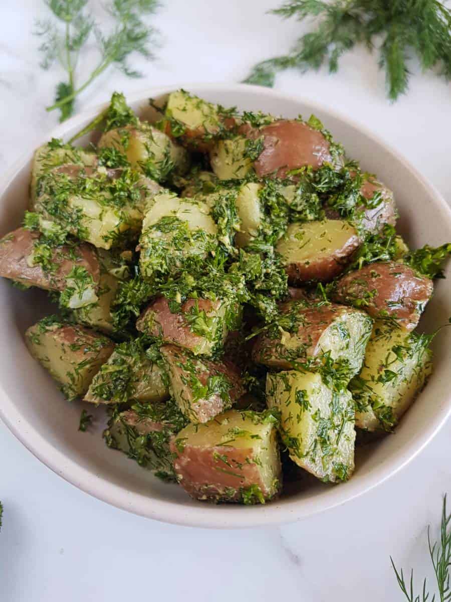 Olive oil potato salad in a bowl.