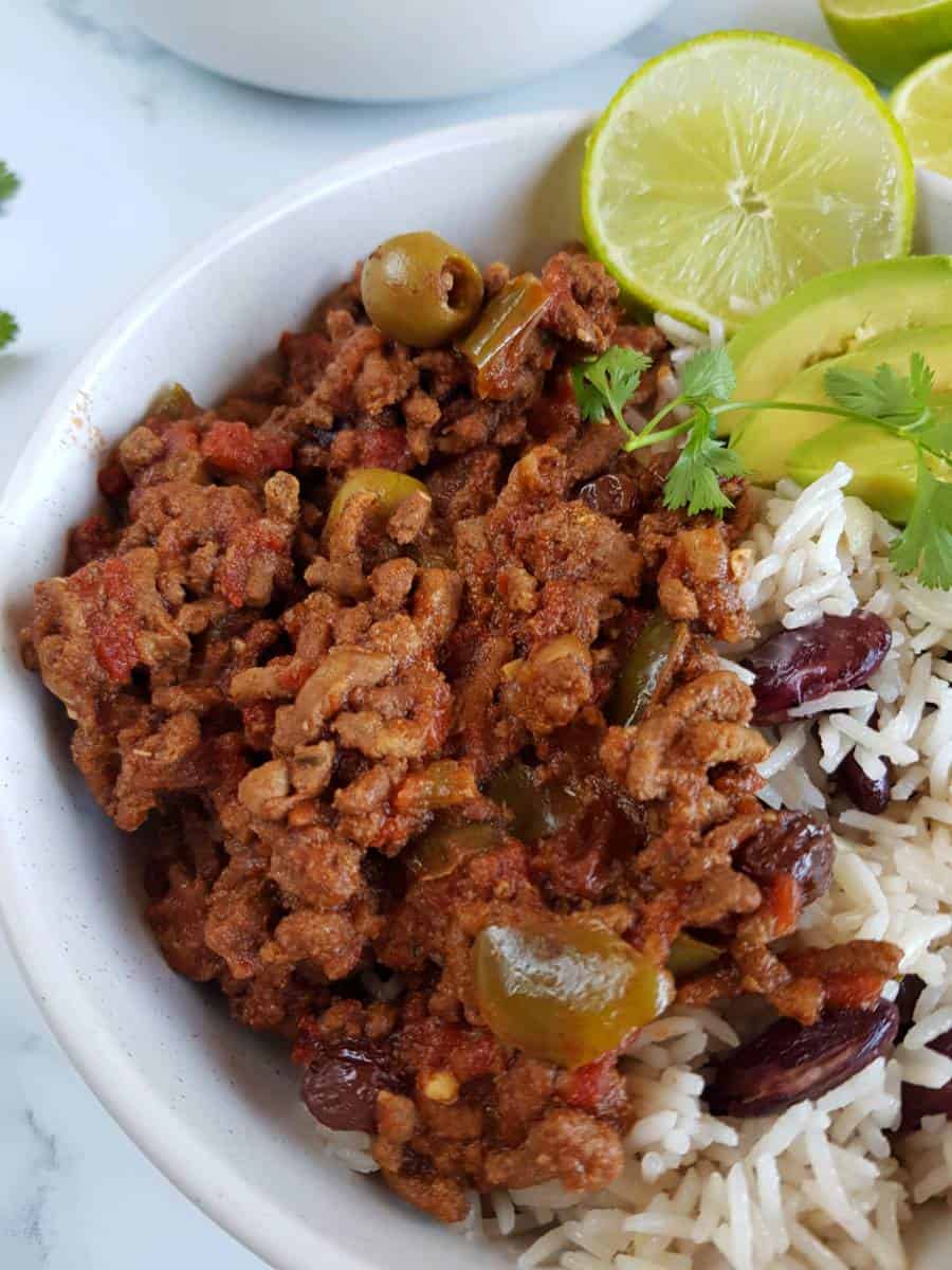 Picadillo with lime and rice.