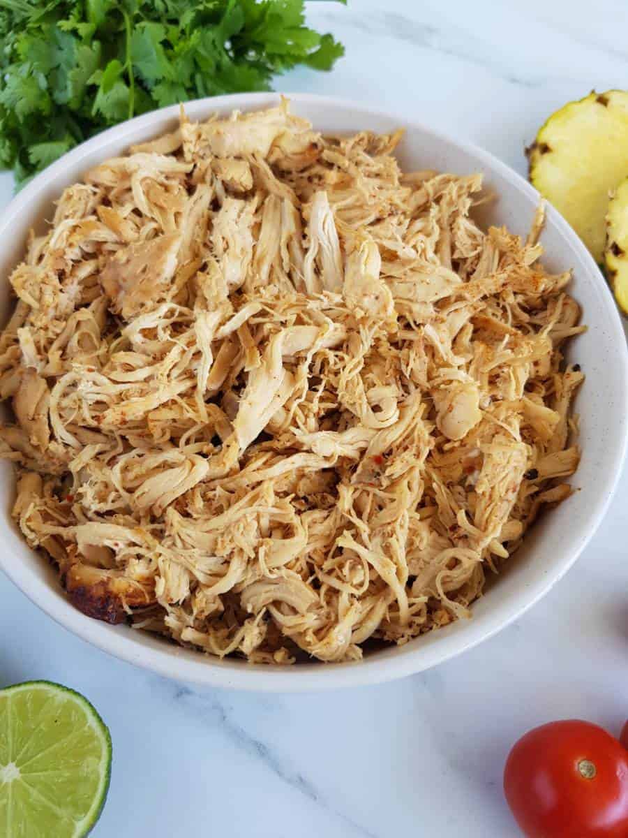 Pulled chicken with Cajun seasoning.